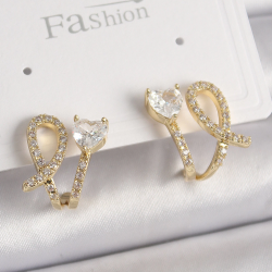 Mey İthalat® Pirinç Gold Renk Düğüm Model Zirkon Taşlı Kalp Detay Kadın Küpe