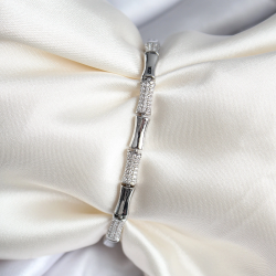 Mey İthalat® Pirinç Kemik Model Zirkon Taşlı Gümüş Renk Kadın Bileklik